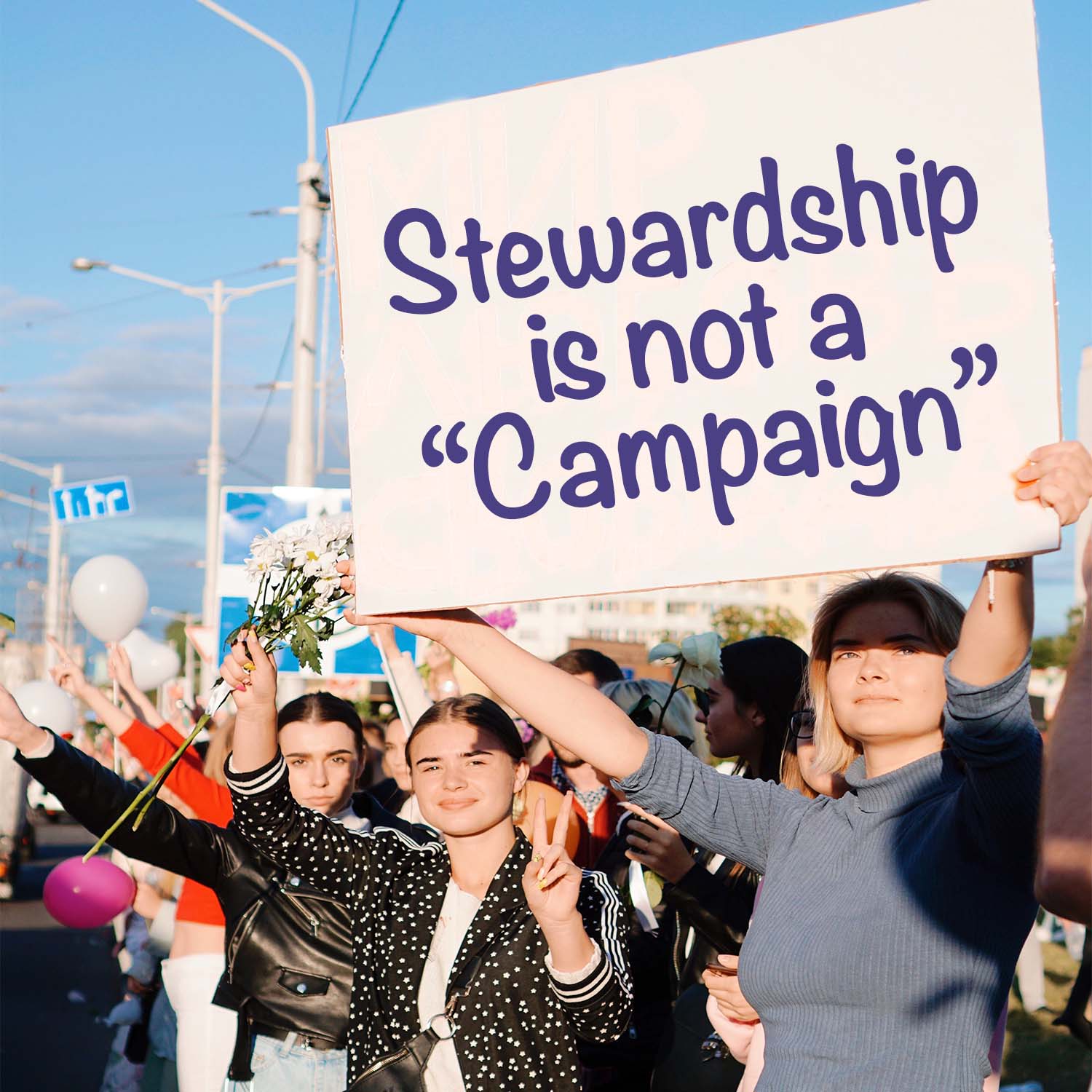 Protestors carrying a sign that says "Stewardship is not a campaign" Moravian MMFA